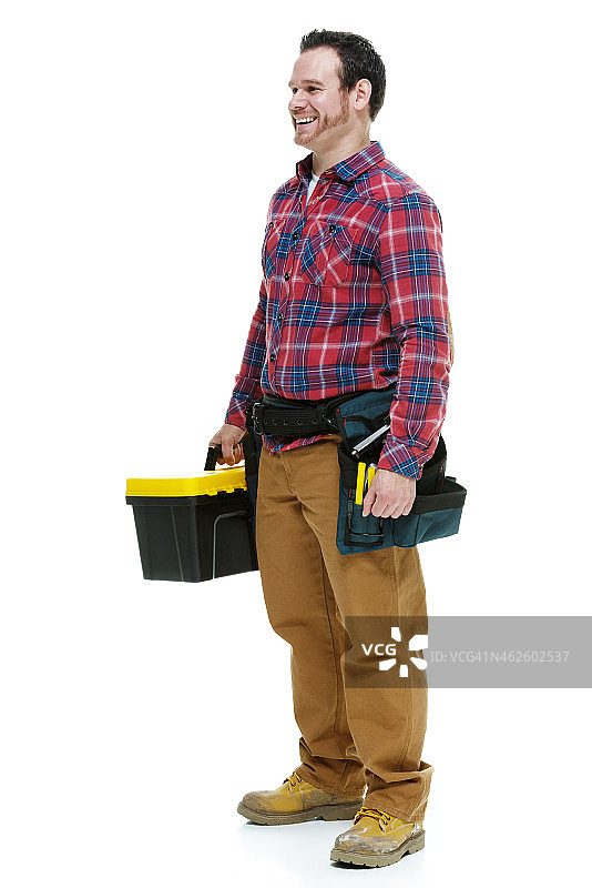 微笑的木匠拿着工具箱图片素材