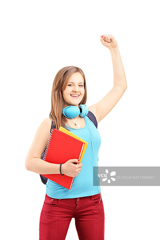 举手表达快乐的女学生图片素材