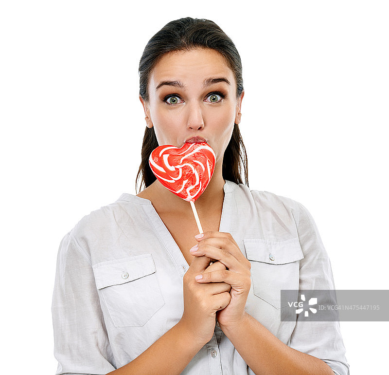她喜爱棒棒糖！图片素材