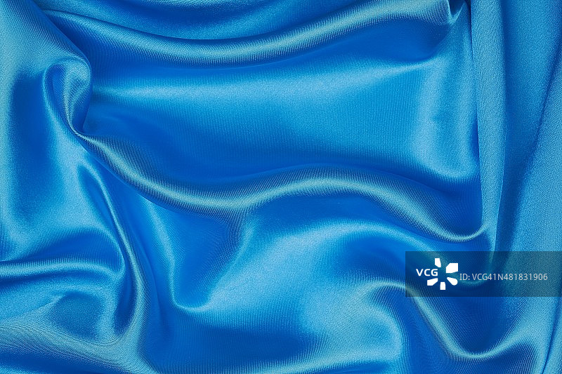 波浪抽象背景的蓝色丝绸图片素材