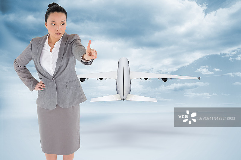 亚洲女商人指着的合成图像图片素材
