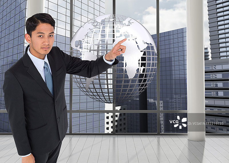 亚洲商人指着的合成图像图片素材