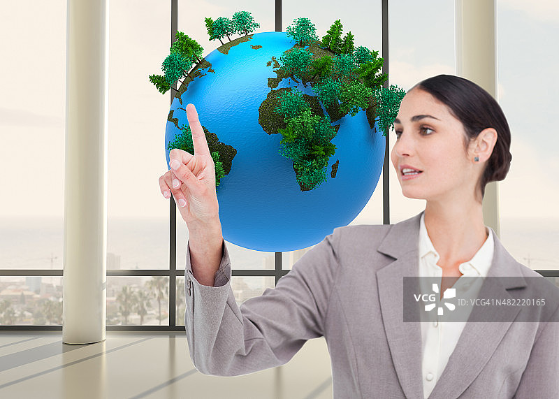 女销售员操作触摸屏的合成图像图片素材