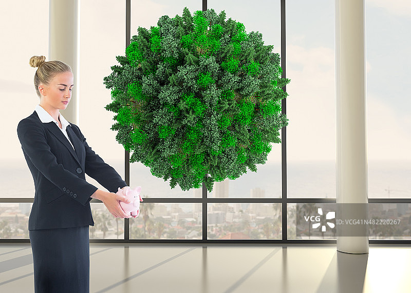 拿着粉色小猪储蓄罐的女商人合成图像图片素材