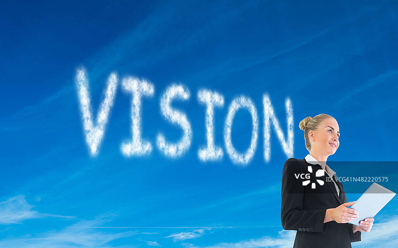 女商人手持新平板电脑的合成图像图片素材