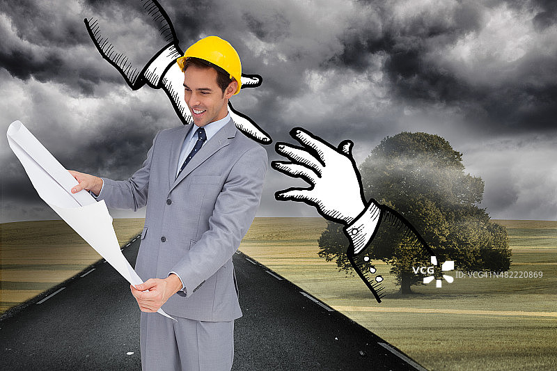 戴安全帽的建筑师查看图纸合成图像图片素材