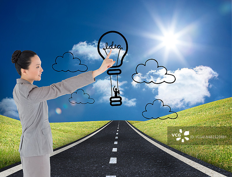 微笑女商人指点手势合成图像图片素材