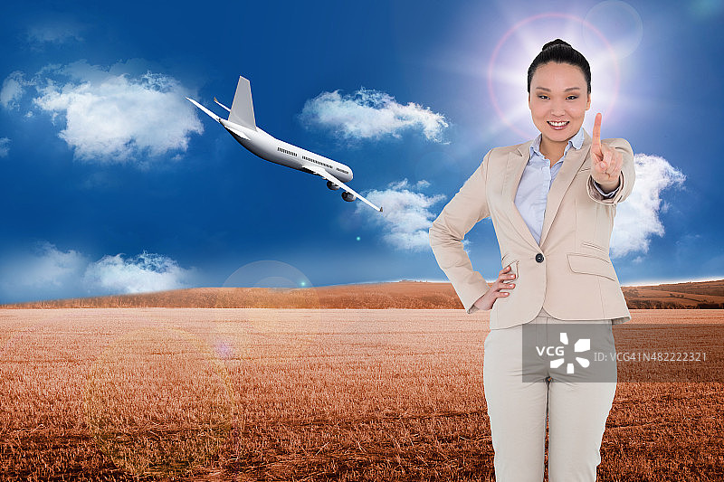 亚洲女商人指着的合成图像图片素材