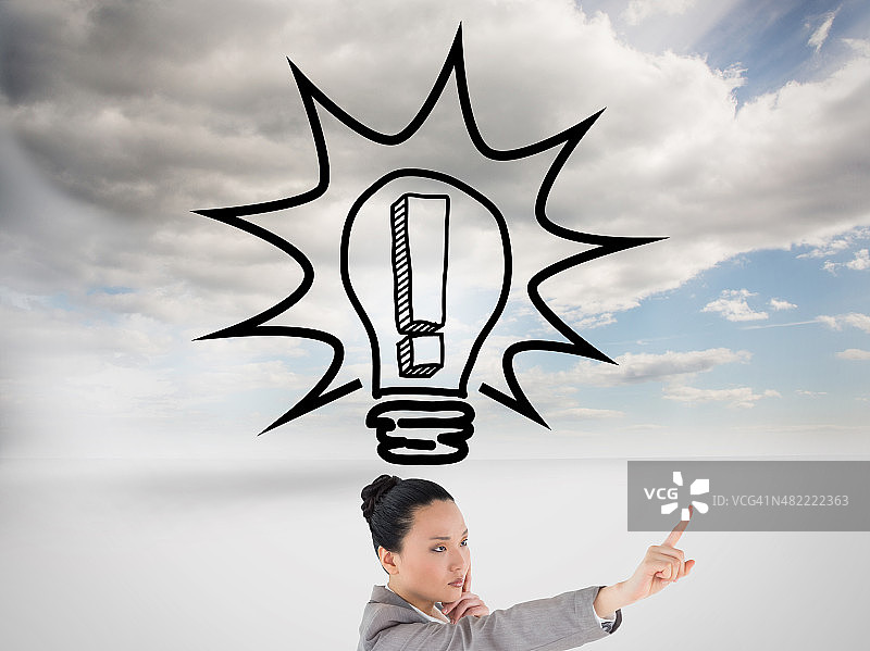 亚洲女商人指着的合成图像图片素材