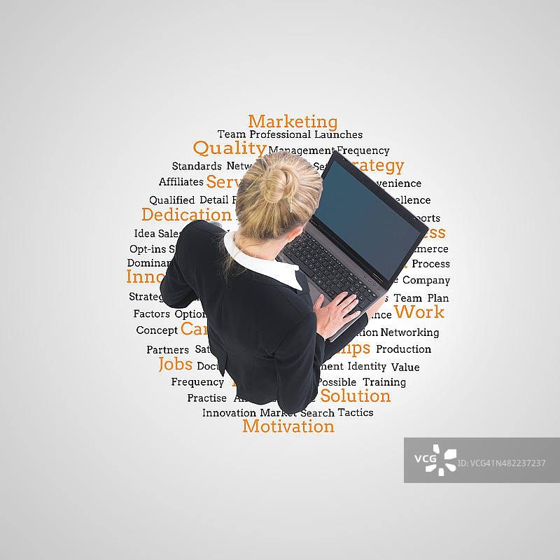 女商人使用笔记本电脑的合成图像图片素材