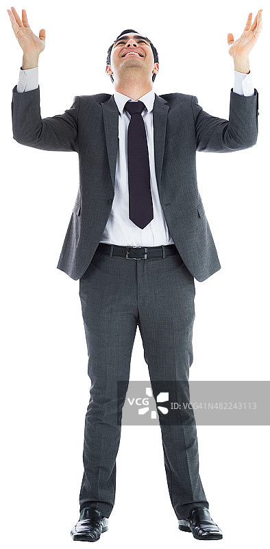 快乐的商人举起双臂图片素材