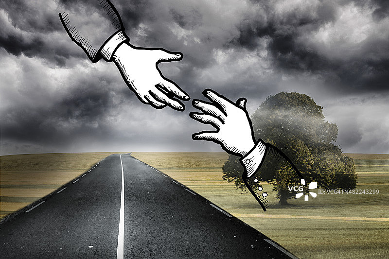 阴沉乡村背景上的双手图案图片素材