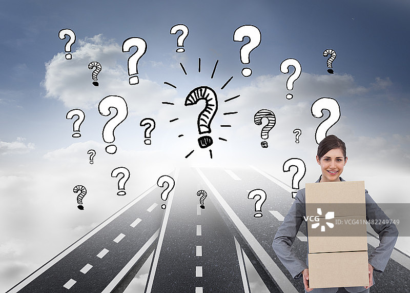 微笑的女商人搬运纸箱的合成图像图片素材