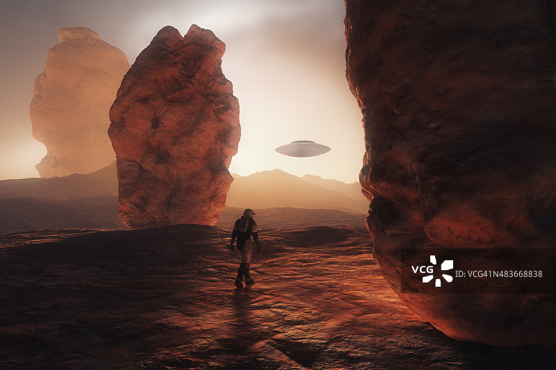 宇航员在火星行走发现不明飞行物图片素材