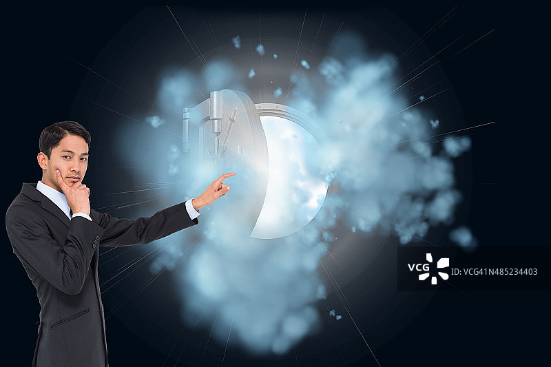 深思熟虑的亚洲商人的综合形象图片素材