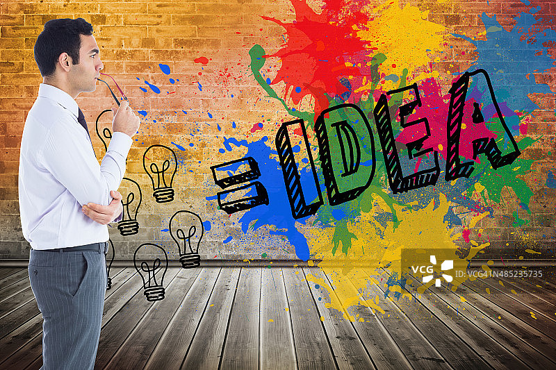 表情严肃的商人拿着眼镜的合成图像图片素材