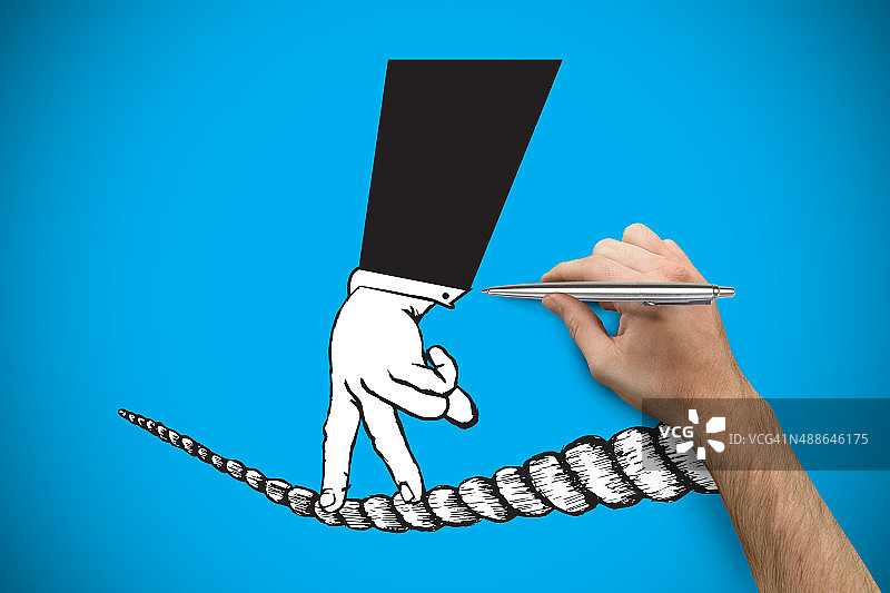 手握银笔的合成图像图片素材