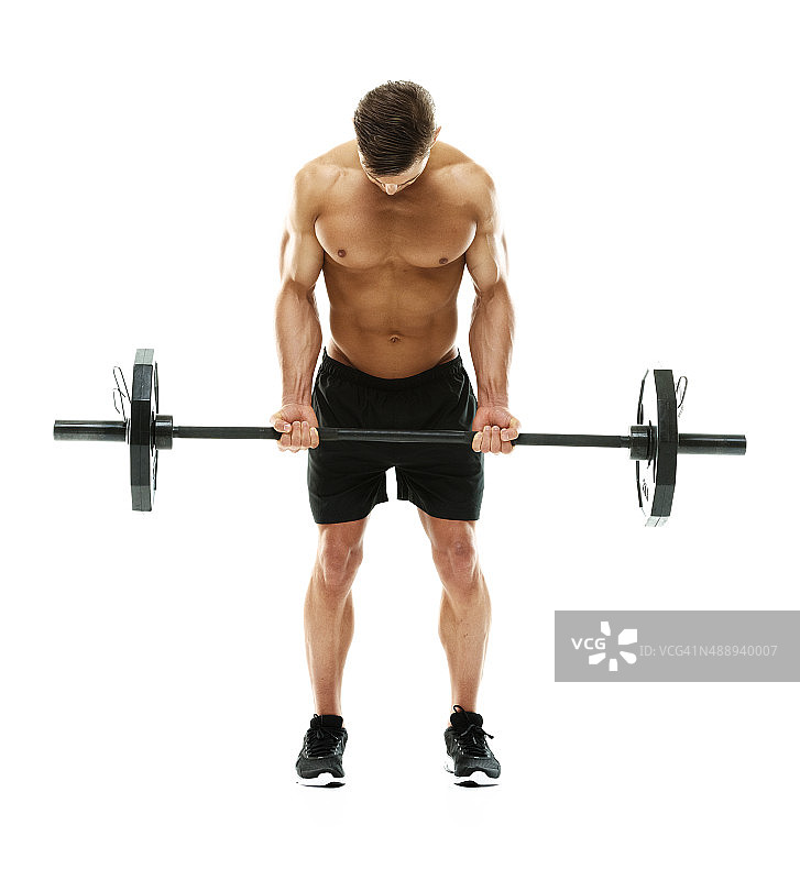 举着杠铃的健壮男人图片素材