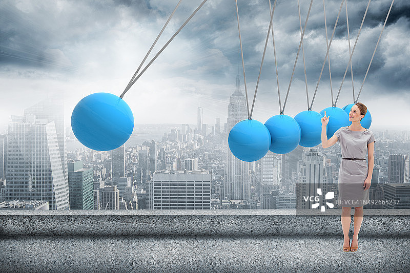 指向上方的连衣裙微笑女人合成图像图片素材