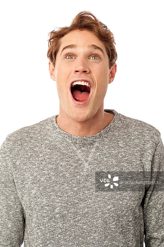 张着嘴的惊讶的年轻人图片素材