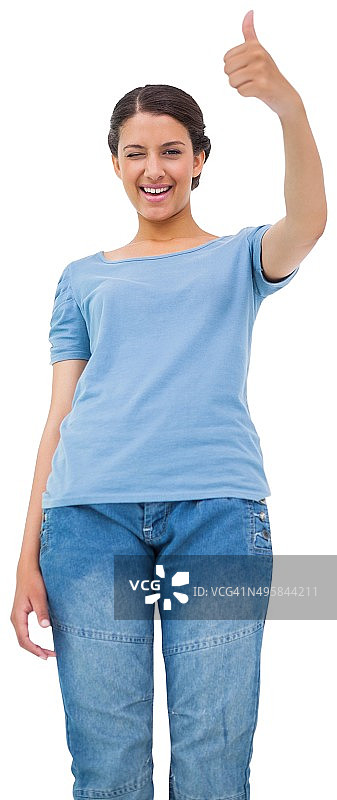 漂亮的棕发女孩竖起大拇指图片素材