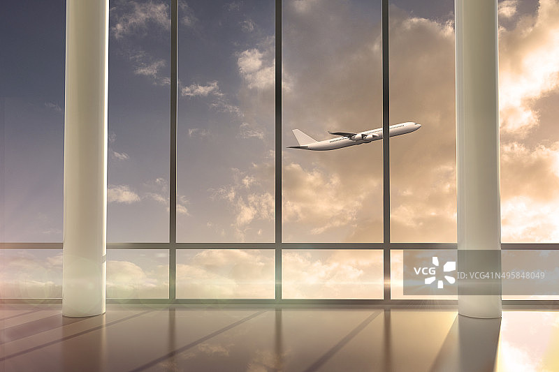 日出时飞机飞过窗户图片素材