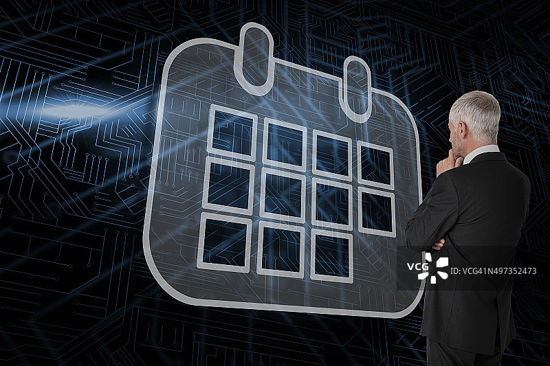 日历和正在观看的商人合成图像图片素材