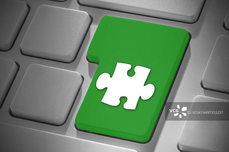 在回车键上的拼图块合成图像图片素材