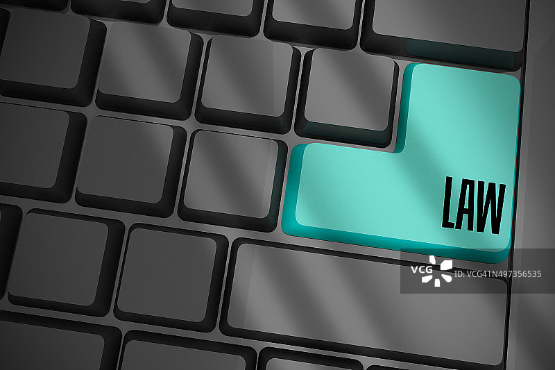 黑色键盘上的蓝色法律键图片素材