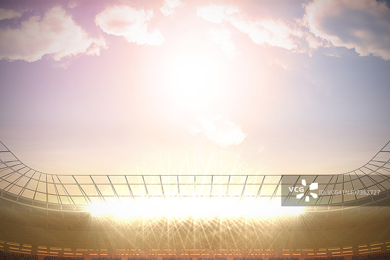 晴朗蓝天下的大型足球场图片素材