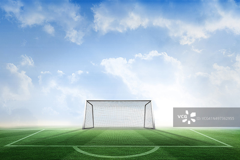 蓝天下足球场和球门图片素材