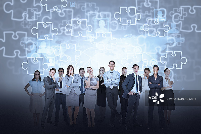 以拼图为背景的商务团队图片素材