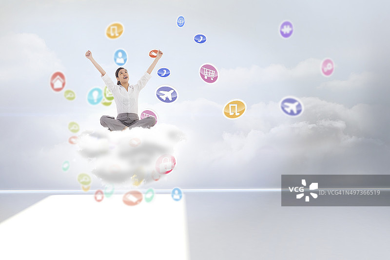 盘腿而坐欢呼的女商人合成图像图片素材
