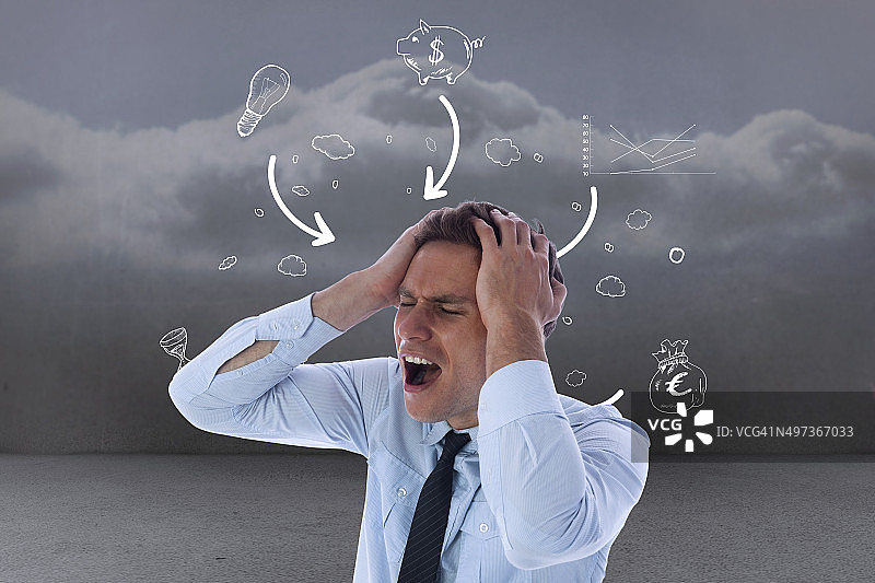 合成图：双手抱头的压力男商人图片素材