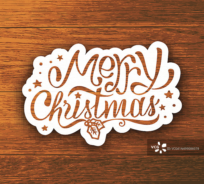木纹背景上的圣诞节手写字母贴纸图片素材