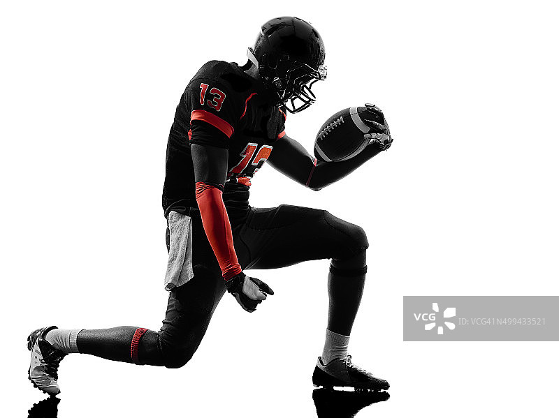 庆祝胜利的美式橄榄球运动员剪影图片素材