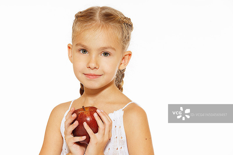 手持苹果的迷人女孩图片素材