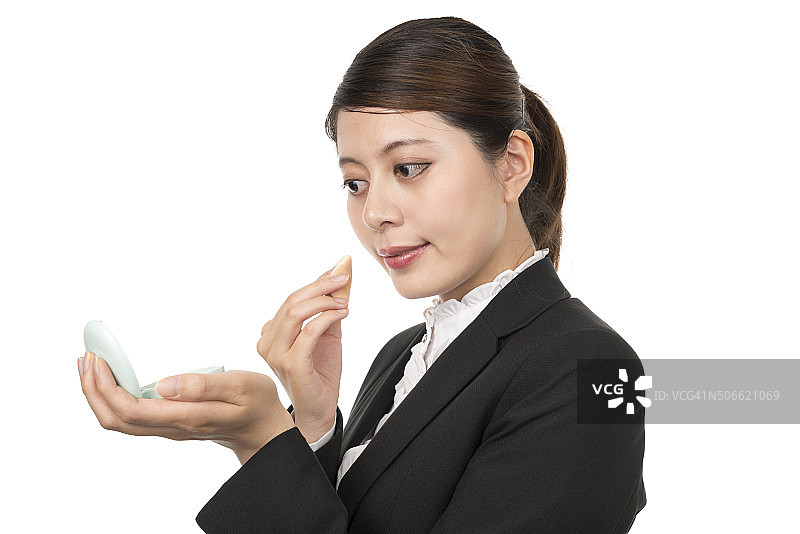 正在化妆的女商人图片素材