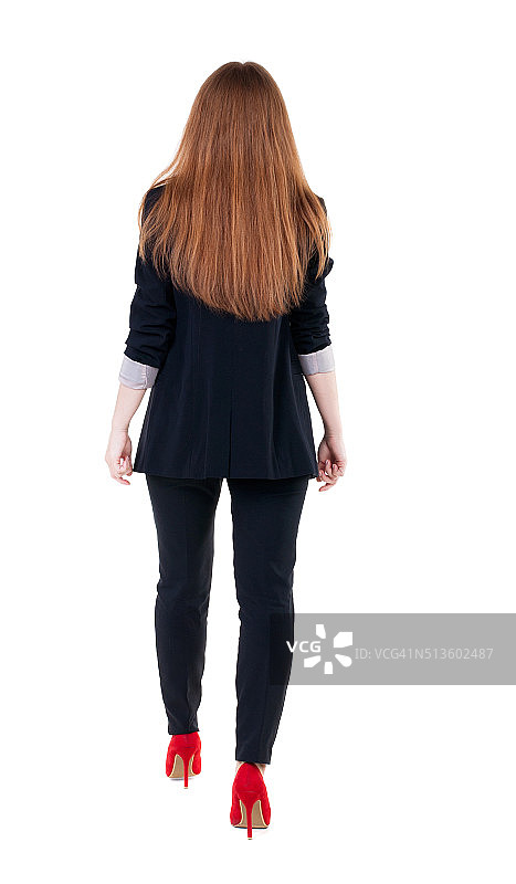 行走的红发女商人图片素材