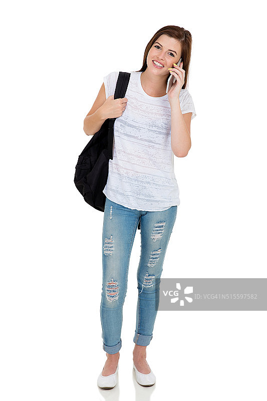 用手机交谈的年轻大学生图片素材