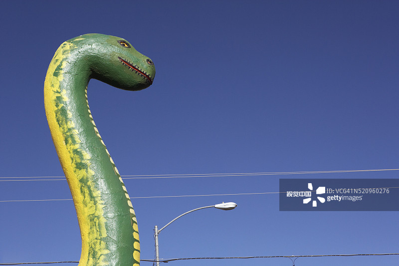 绿色恐龙和电线图片素材