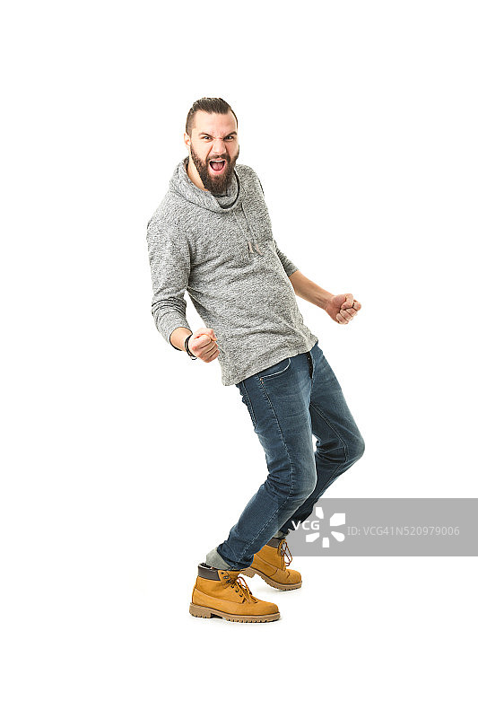 年轻英俊男人的全身照图片素材