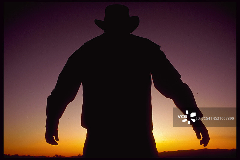 日落时分的牛仔剪影图片素材