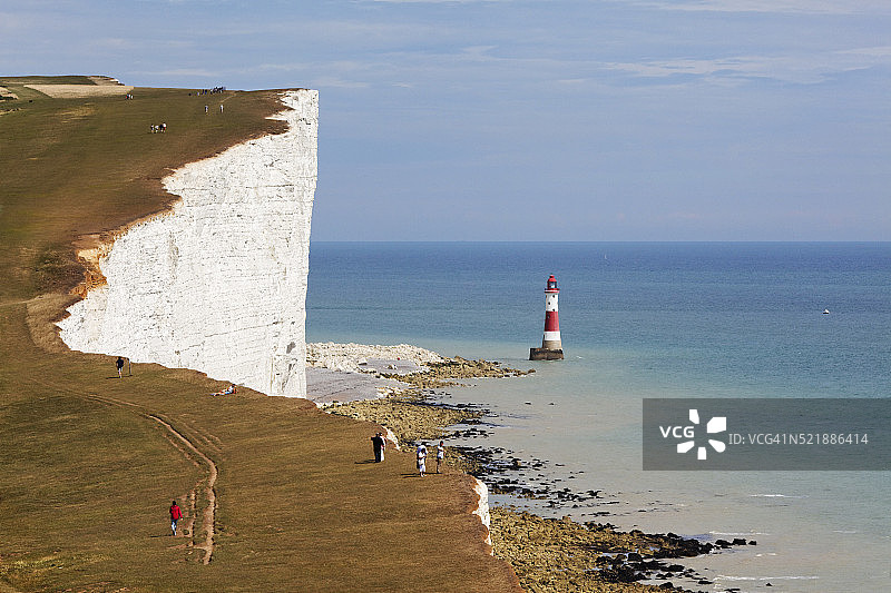 苏塞克斯丘陵和比奇角灯塔的白垩悬崖图片素材