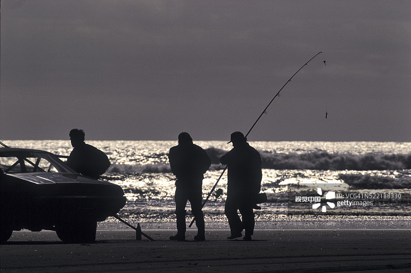 新西兰九十英里海滩的渔民图片素材