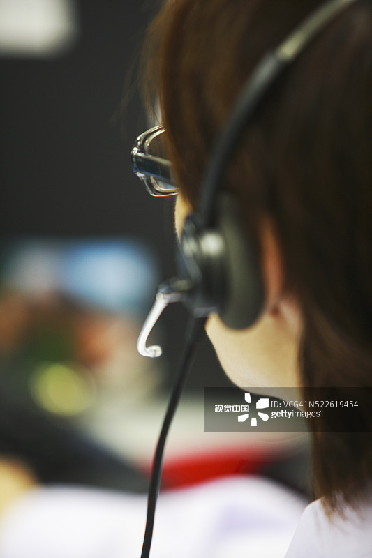 戴电话耳机的操作员图片素材