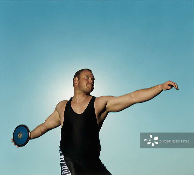 运动员投掷铁饼图片素材