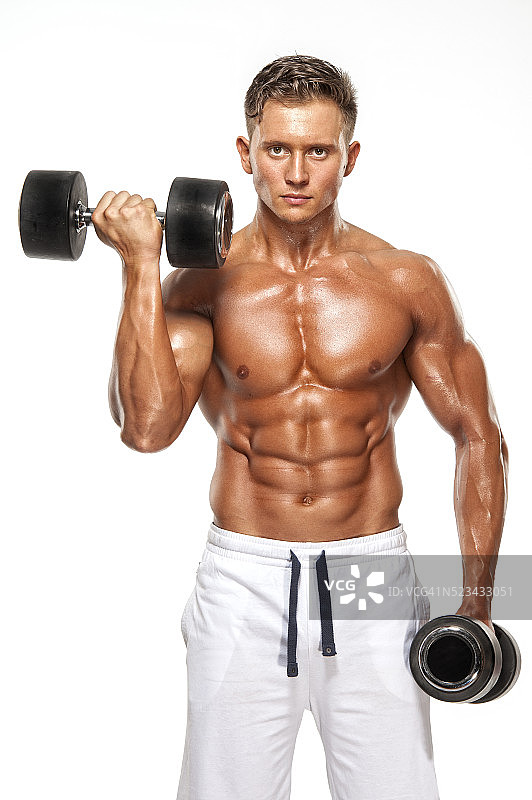 年轻男人举重锻炼图片素材