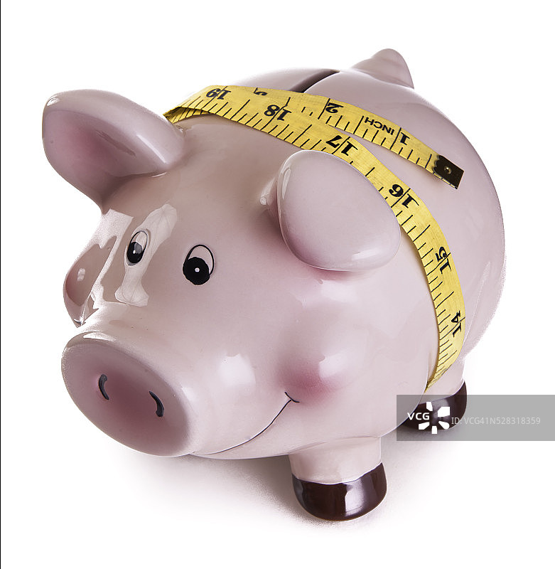 带卷尺的储蓄罐图片素材