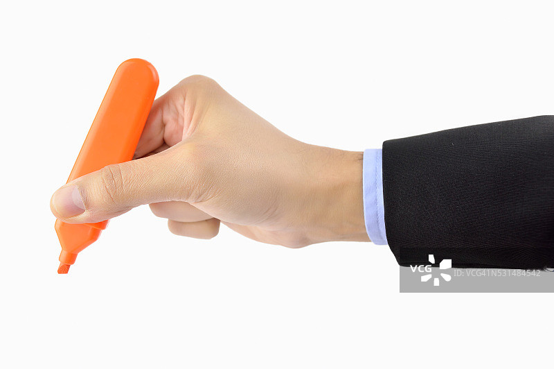 使用橙色记号笔的行政人员图片素材